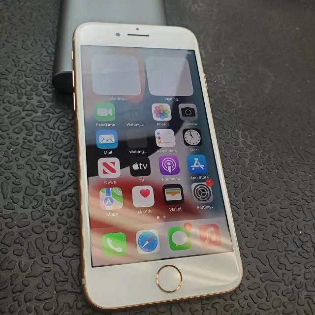 iPhone 8 Plus on phone repair technician's desk